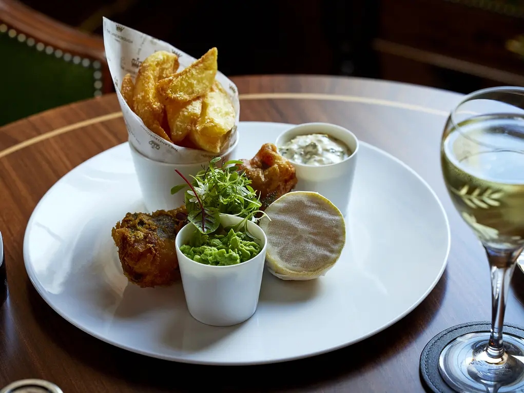 Cod and chips with a glass of white wine