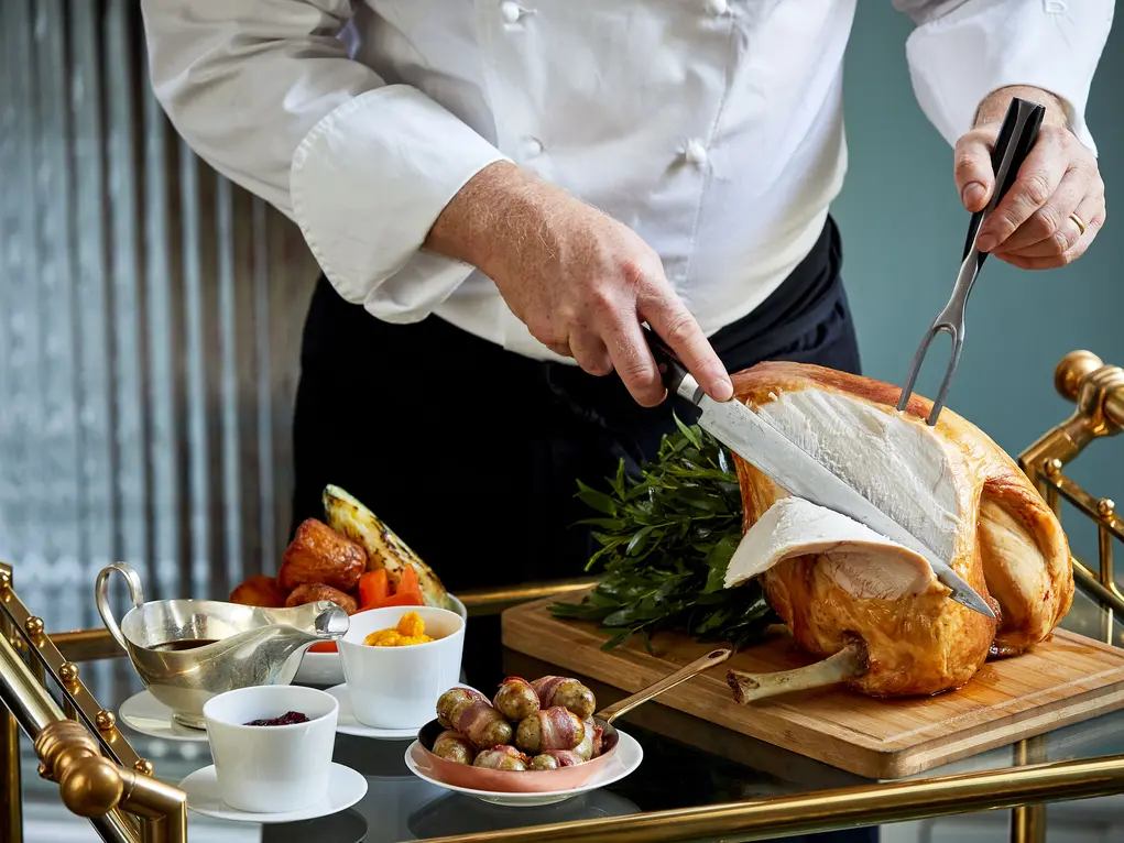 chef carving turkey