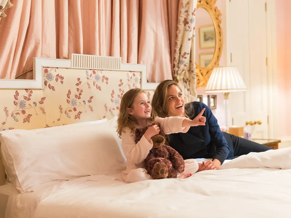 mother and daughter in a bed